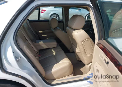 2006 Cadillac Dts from USA, damaged, VIN 1G6KD57Y06U210561